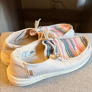 Beige Hey Dude Slip-Ons with Striped Knit Vamp